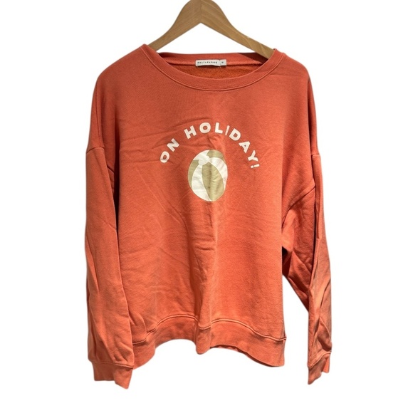 South Parade Tops - SOUTH PARADE orange ‘on holiday” graphic print sweatshirt - size M